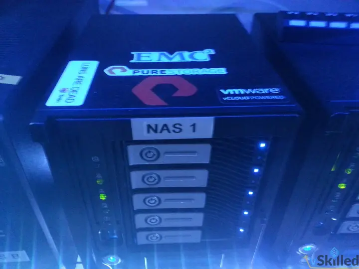 Thecus N5550 labeled NAS 1 with illuminated drive bays