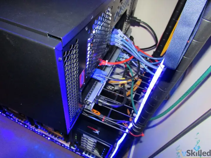 Rear of the home lab server with network and power cables connected