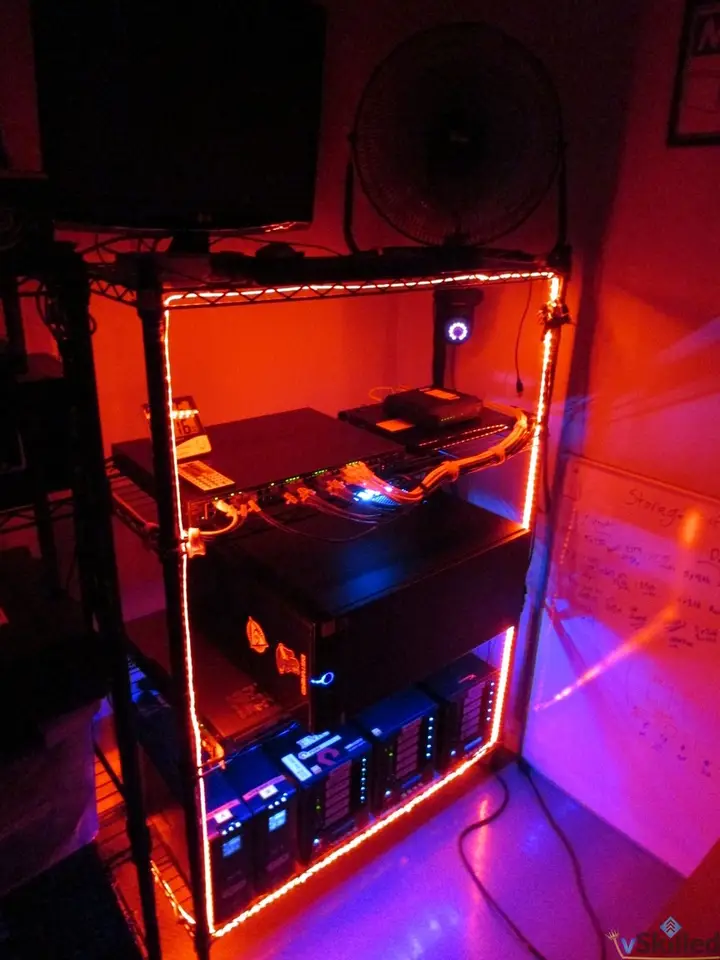 Home lab rack outlined by red LED strips