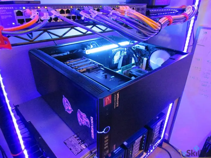 VMH02 tower with its side panel removed on the home lab shelf